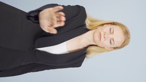 Vertical-video-of-Business-woman-saying-stop-to-camera.